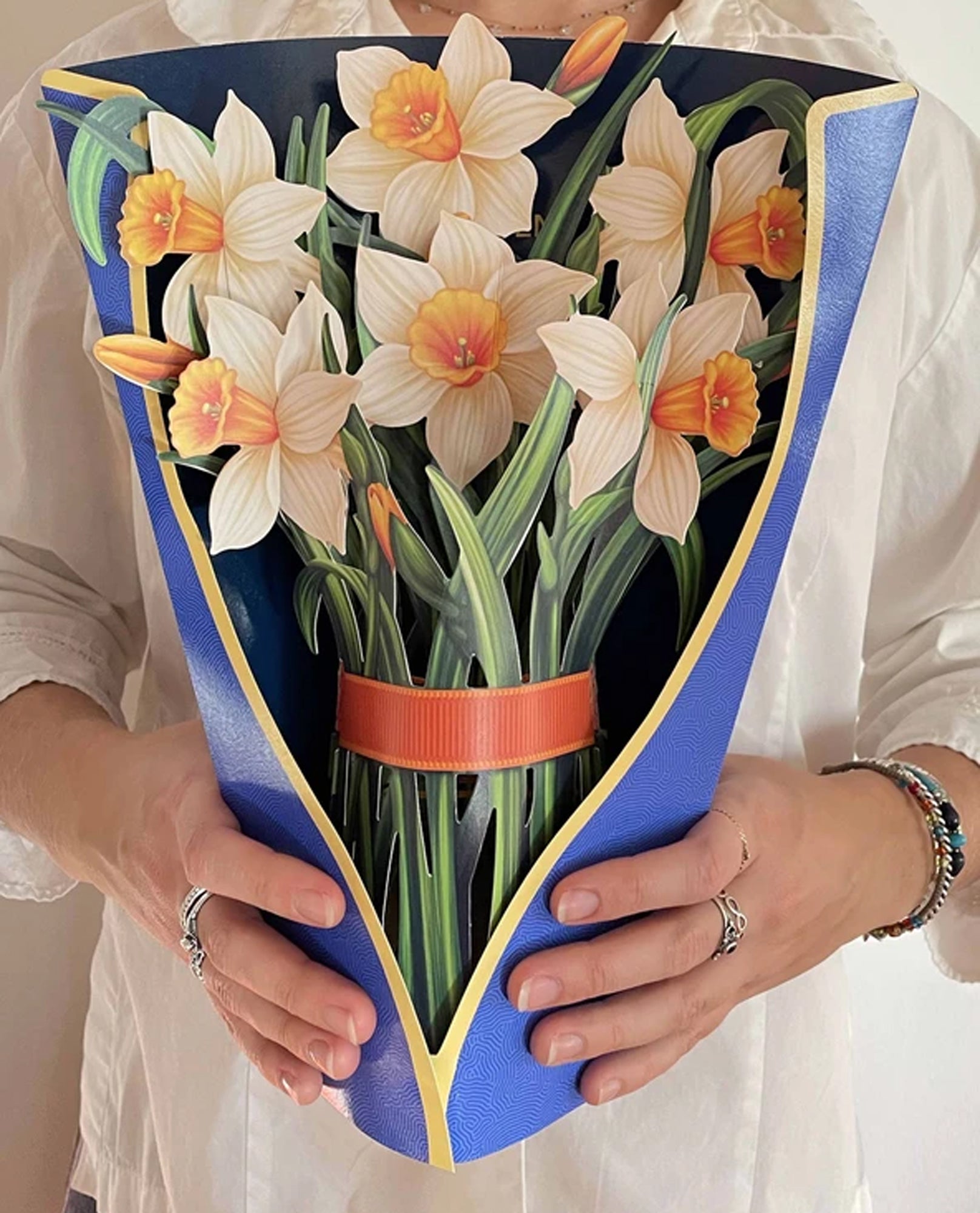 http://theclothingcove.com/cdn/shop/products/Freshcut-Paper-3753-Daffodil-Pop-Up-Flowers.jpg?v=1620060674