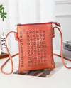 H440 DAISY LASER CUT CROSSBODY BAG CORAL