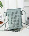 H440 DAISY LASER CUT CROSSBODY BAG TEAL