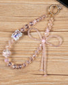 LUXE CELL PHONE HOLDER CRYSTAL BOW-PINK