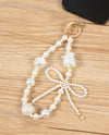 LUXE CELL PHONE HOLDER pearl bow
