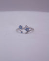 RS COVENANT 6744 LT BLUE OPAL FLOWER CZ RING SILVER