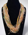 SCARVES OF WESTWOOD LA PETITE FIBER NECKLACE 201 peach/green