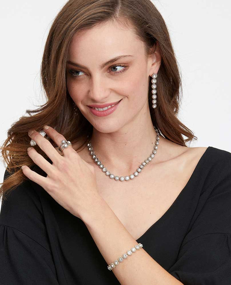 Model wearing Silver Brighton JL7701 Twinkle Link Necklace with glamorous shimmering Swarovski gems