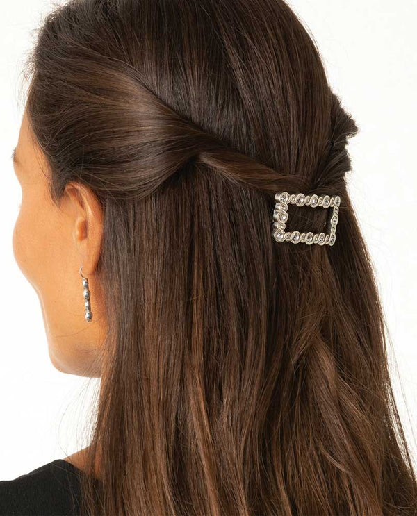 Model wearing Silver Brighton Infinity Sparkle Small Barrette J82271 with Swarovski crystals 