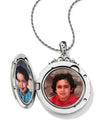 Silver circular Brighton JL9190 Etoile Locket Necklace with eight point star design holds 2 photos